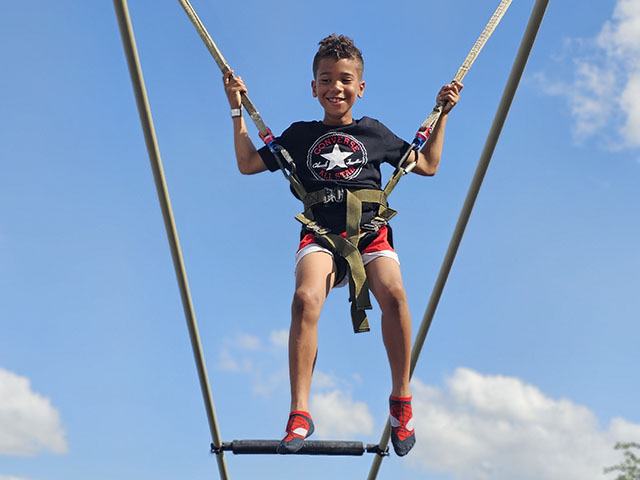 Kid in Bounce Harness